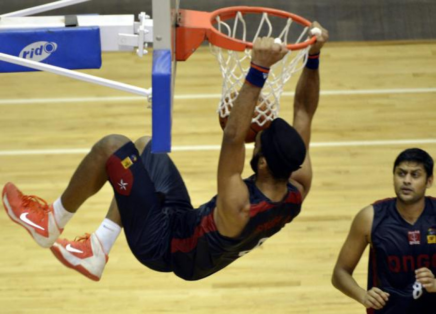 Amritpal Singh Slam Dunks Basketball