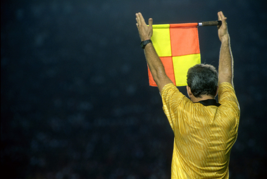 Assistant referee informing a substitution