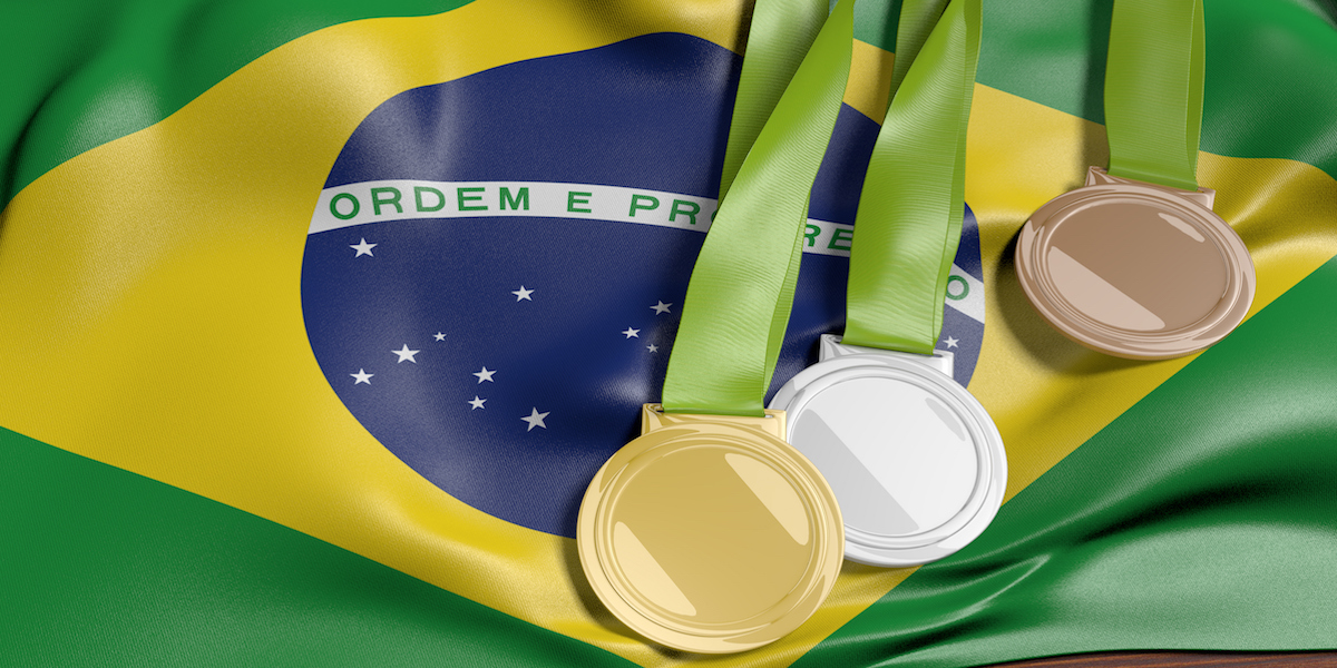 Brazilian flag with Olympic medals