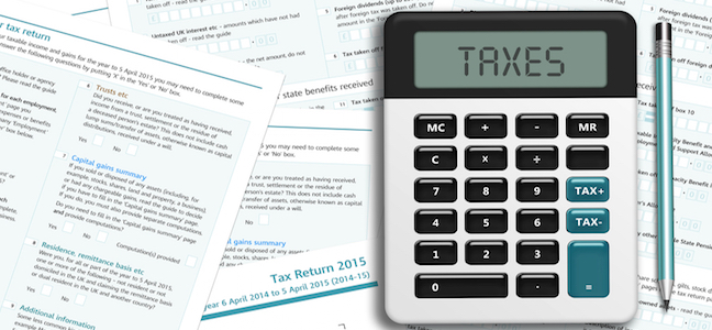 Calculator on UK tax papers