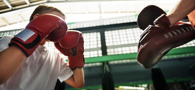 Child in a boxing training session