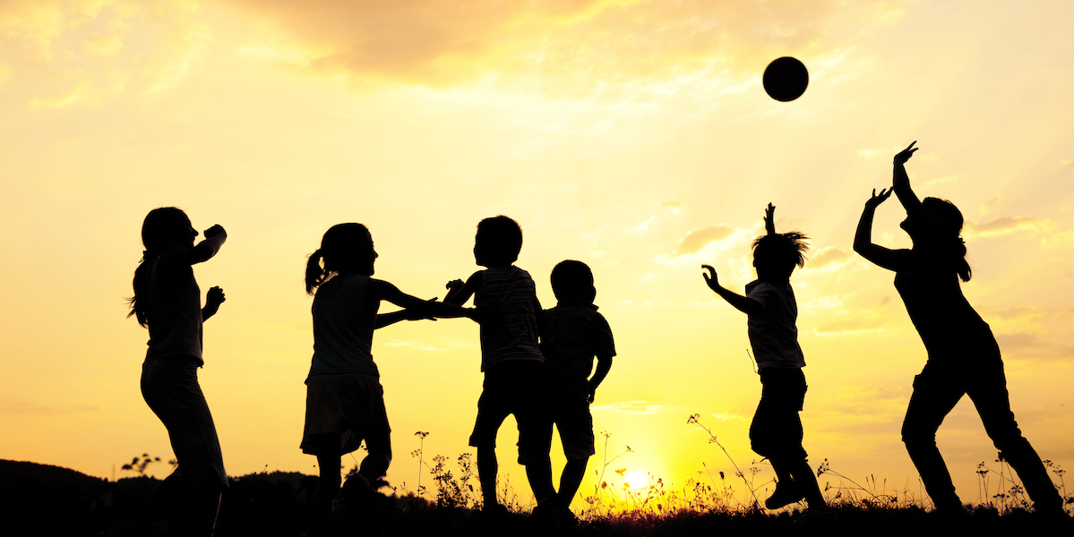 Children playing on field