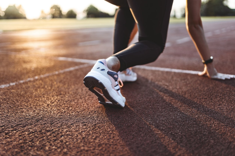 female runner on track