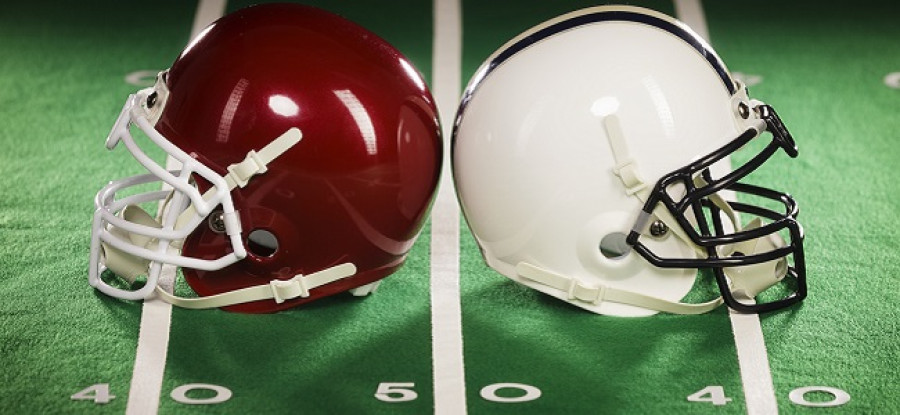 Football helmets on yardline