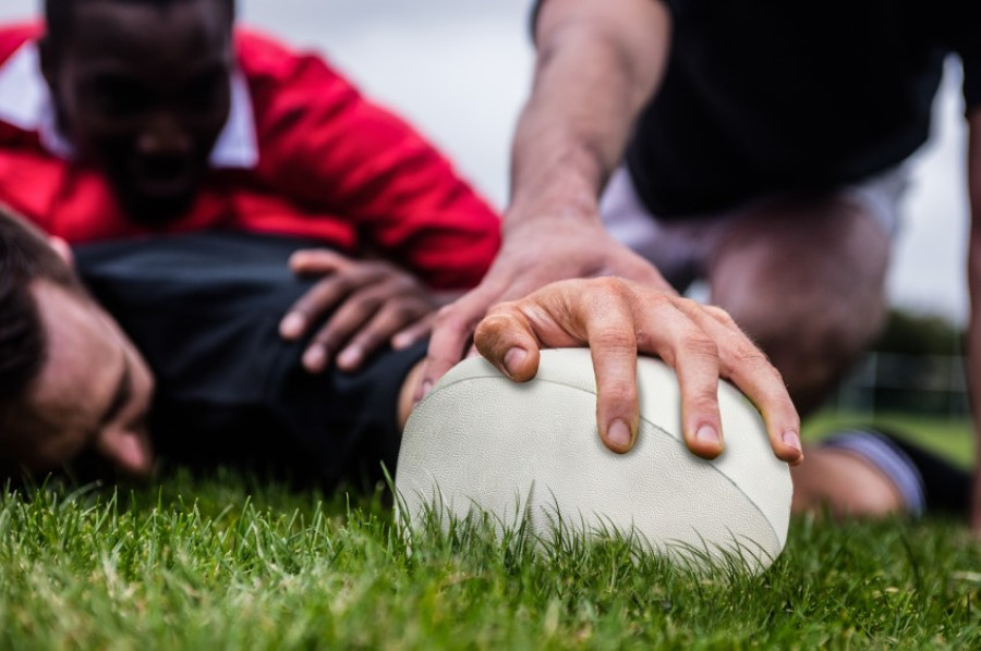 Image of rugby player scoring a try