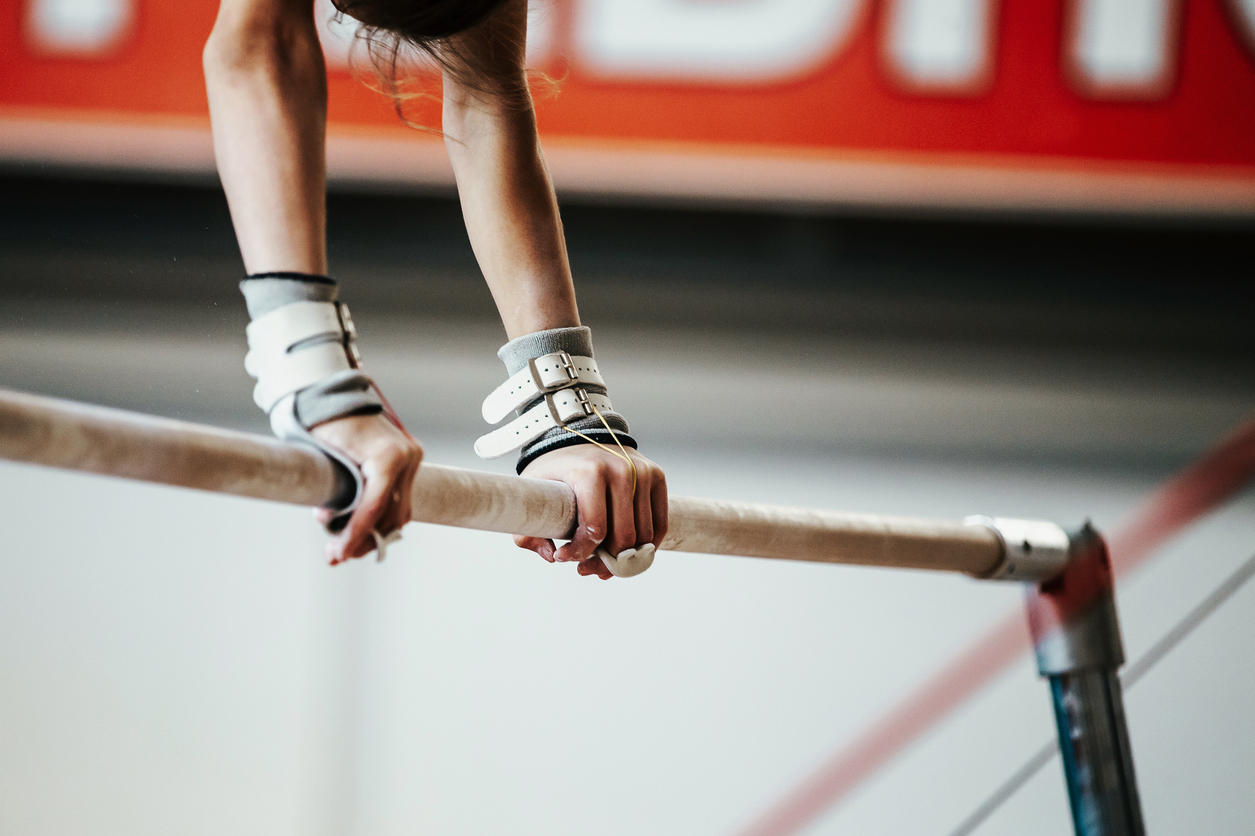 Gymnast exercise on bar