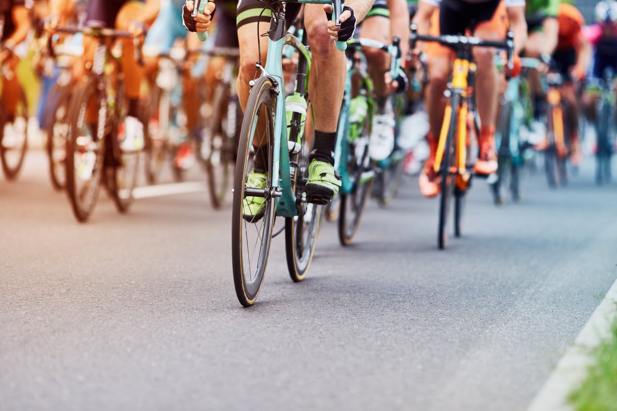 Spanish cyclists going up a hill