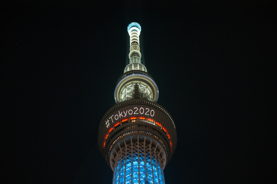 The skytree tower is illuminated at night announcing the Tokyo 2020 Olympics