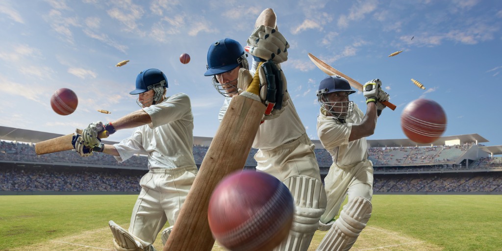 Three Batsman Hitting Cricket Ball