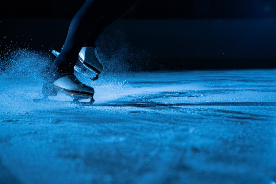 Woman Skating on Ice