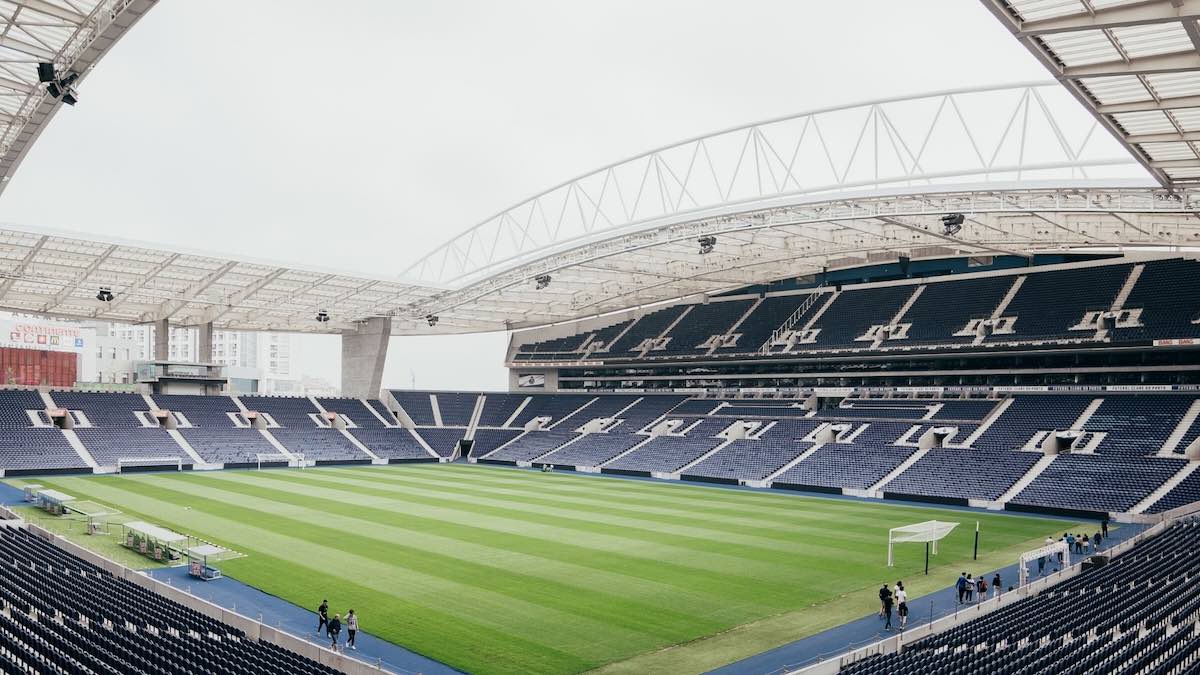 Image of empty stadium with blue seats