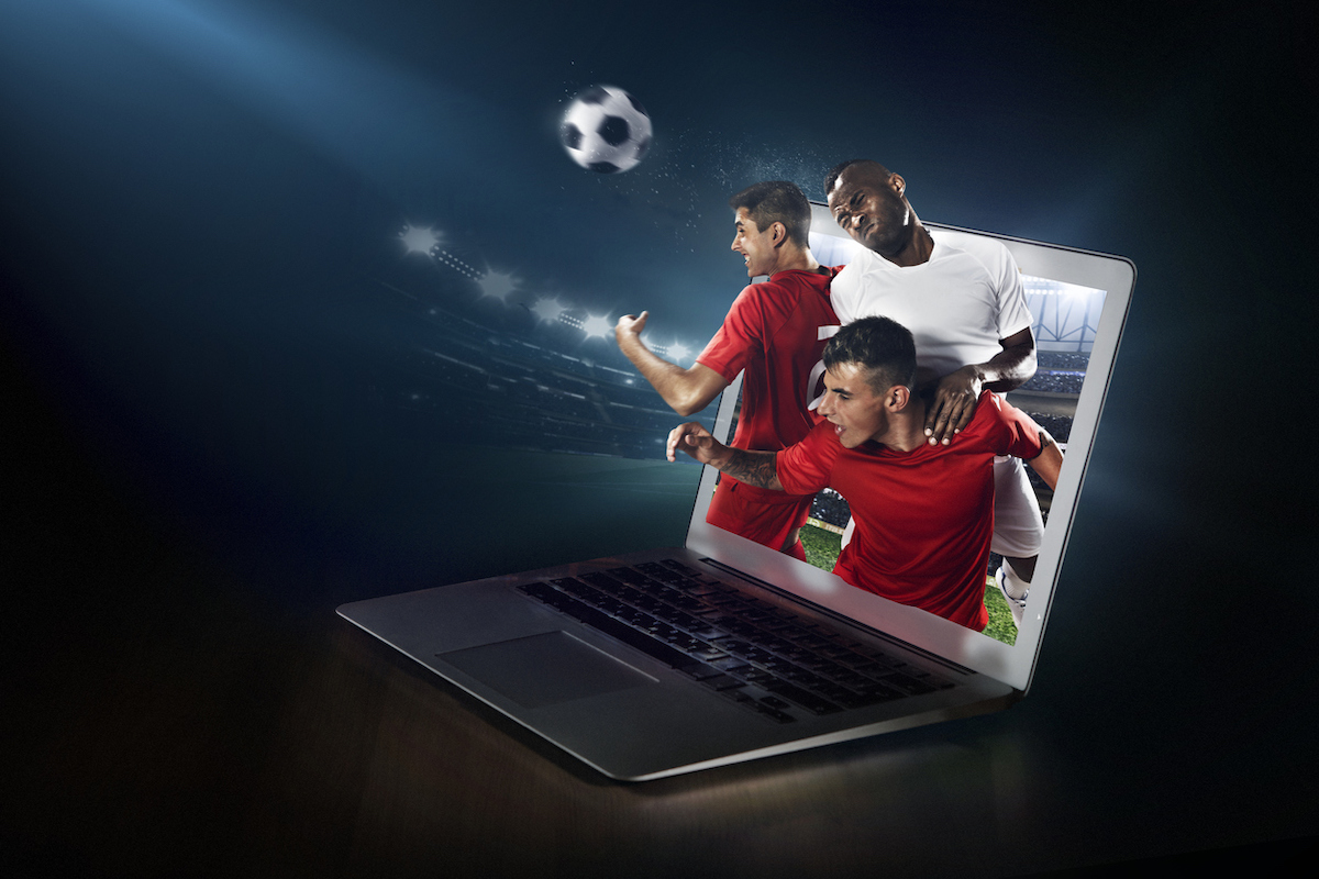 Laptop Screen Showing Players Playing Football