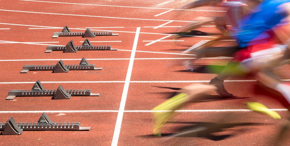 Runners on starting blocks