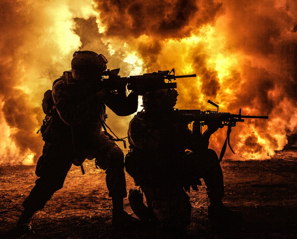 Title images - two soldiers in battle surrounded by flames and smoke