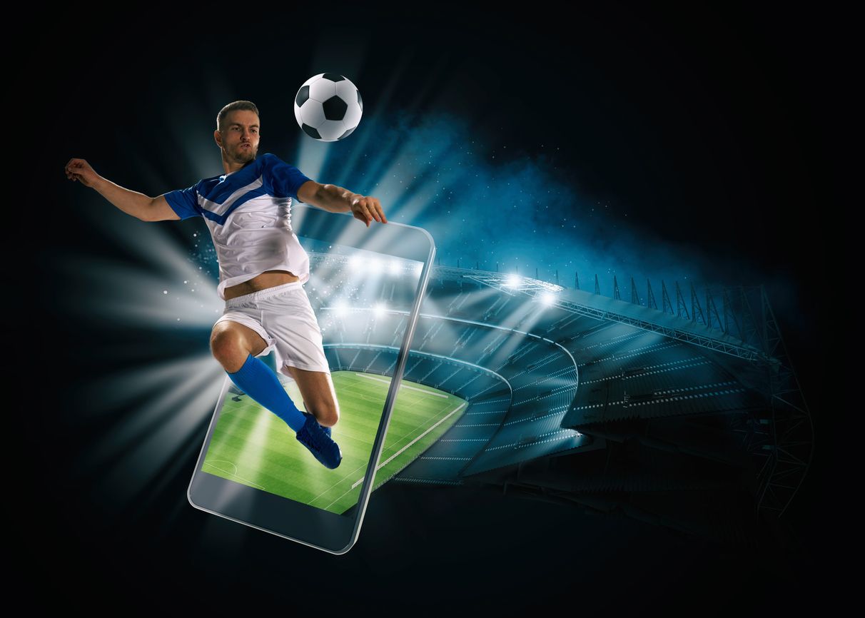 Footballer kicking out of a phone