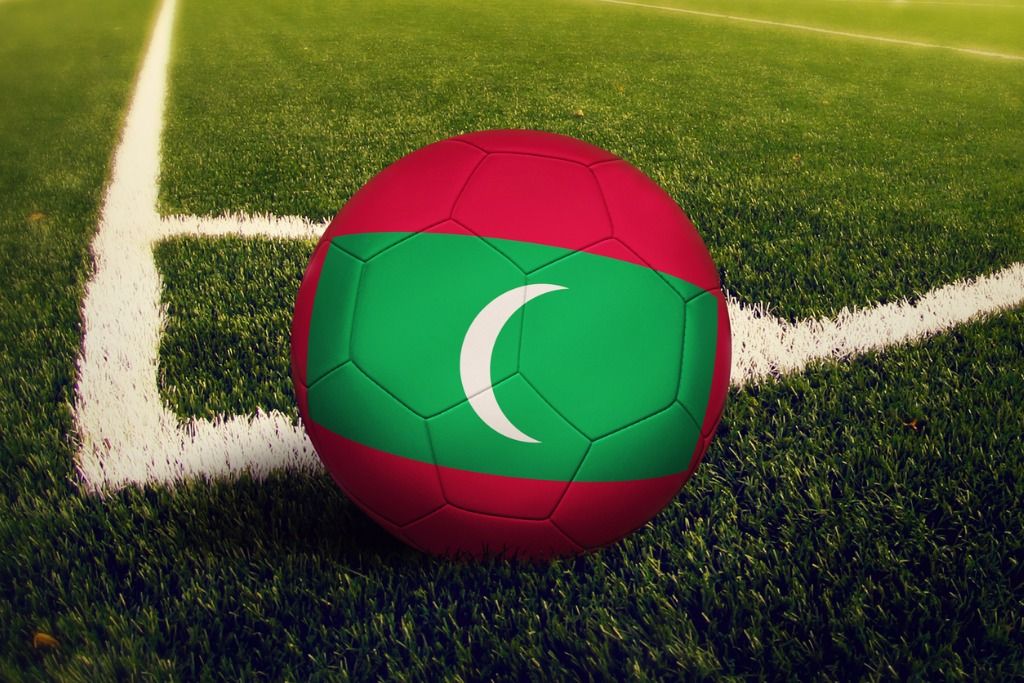 Ball On Corner Kick Position On Soccer field with Maldives Flag On Ball