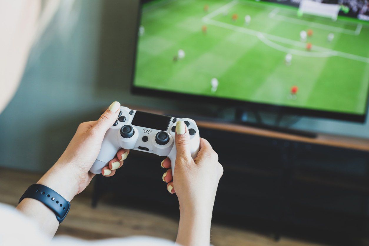 Girl Playing Football Video Game